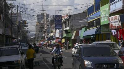 San Pedro Sula genera un movimiento comercial en distintos rubros. Los contribuyentes están pagando. Fotos: Amílcar izaguirre