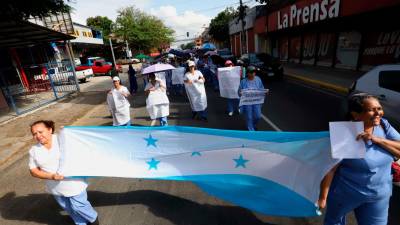 <b><span class=mln_uppercase_mln>Movilización.</span></b> La protesta de ayer fue en la 3 avenida de SPS.