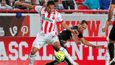ARCHIVO - En esta foto del lunes 17 de septiembre de 2018, Diego Maradona, tÃ©cnico de Dorados de Sinaloa, tras la victoria 4-1 ante Cafetaleros, en su primer partido como tÃ©cnico del club de la segunda divisiÃ³n de MÃ©xico. (AP Foto/Eduardo Verdugo)