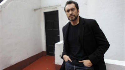 CORRECTS NATION OF IMMIGRATION LAW CENTER - FILE - In this Feb. 16, 2012 file photo, Mexican actor Demian Bichir poses during an interview with the Associated Press in Mexico City, Mexico. Bichir will be recognized on Thursday, Dec. 6, 2012 with the prize Luminaria Valiente from the U.S.' National Immigration Law Center for his work in favor of migrants. (AP Photo/Dario Lopez-Mills, File)