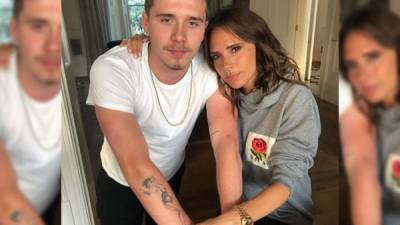 Victoria Beckham (d) junto a su hijo mayor Brooklyn. Foto redes.