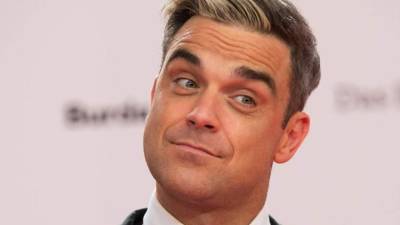 Robbie dijo que tenía dolor cabeza y también problemas para respirar.// Foto archivo.