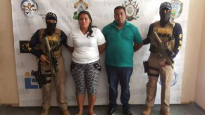 Pareja capturada en El Progreso, Yoro acusados de extorsión.