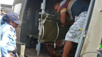 Momentos en que esperaban a Medicina Forense para que reconociera los cuerpos.