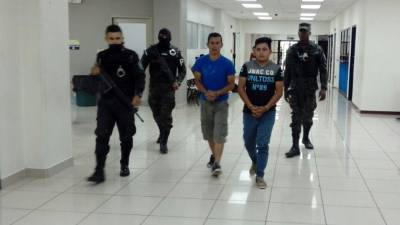 Fran Ariel Benítez y Roger David Nolasco Díaz.