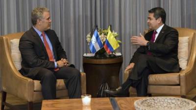Iván Duque, actual presidente de Colombia, junto a Juan Orlando Hernández, presidente de Honduras.
