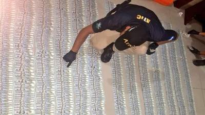 En seguimiento a una transacción de droga y dinero fue que encontraron la moneda extranjera.