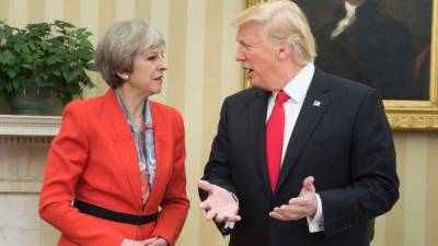 US President Donald Trump (L) listens as Britain's Prime Minister Theresa May (R) speaks during a press conference following their meeting at Chequers, the prime minister's country residence, near Ellesborough, northwest of London on July 13, 2018 on the second day of Trump's UK visit.US President Donald Trump launched an extraordinary attack on Prime Minister Theresa May's Brexit strategy, plunging the transatlantic 'special relationship' to a new low as they prepared to meet Friday on the second day of his tumultuous trip to Britain. / Getty Images / POOL / Jack Taylor