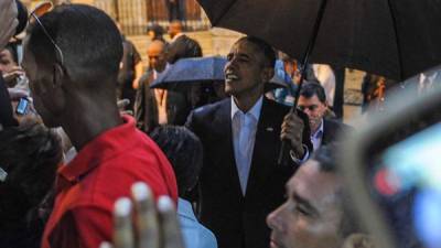 El presidente Barack Obama visita la Habana Vieja en un día lluvioso