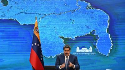 El presidente venezolano Nicolás Maduro habla durante una conferencia de prensa con corresponsales de medios internacionales en el Palacio Presidencial de Miraflores. Foto AFP