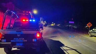 Una patrulla de la Policía de Michoacán cerca del lugar donde se registró el hecho.