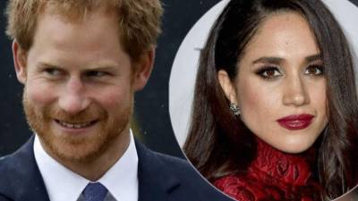 El príncipe Enrique y su novia Meghan Markle.