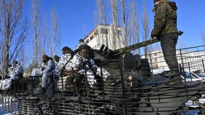 Los militares participan en ejercicios tácticos y especiales conjuntos del Ministerio del Interior de Ucrania, la Guardia Nacional de Ucrania y el Ministerio de Emergencias en una ciudad fantasma de Pripyat.