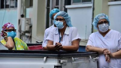 Imagen de archivo de enfermeras en una protesta contra sus condiciones de trabajo y exigiendo equipo de protección personal para evitar ser infectadas por el nuevo coronavirus. Foto AFP