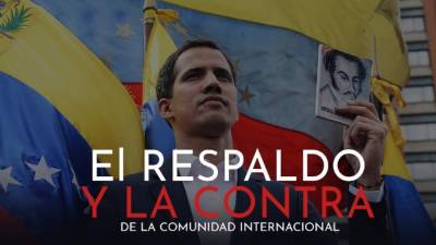Opposition leader Juan Guaido speaks to reporters at the car park of his residence in Caracas, on July 12, 2021. - The Venezuelan opposition on Monday denounced the arrest of a leader very close to Juan Guaid0, who for his part said he had been 'momentarily kidnapped' by security officials at his residence in Caracas. (Photo by Federico Parra / AFP)