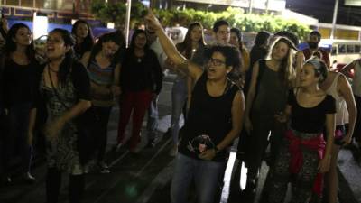 Former guerrilla member and feminist leader Morena Herrera attends a demonstration on the eve of the commemoration of International Women's Day in San Salvador on March 7, 2021. - Herrera fights for the legalization of abortion and helps women who were criminalized for abortion out of prison. (Photo by MARVIN RECINOS / AFP)
