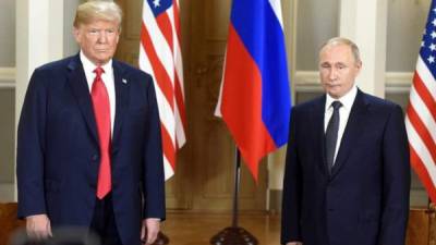 El presidente de EEUU, Donald Trump y su homólogo ruso Vladimir Putin. AFP/Archivo