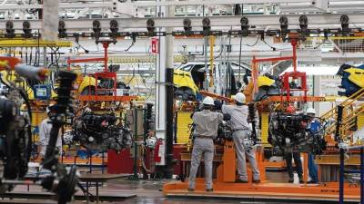 Empleados de la planta de ensamblaje de Ford en Cuautitlán Izcalli, en México.