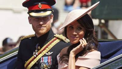 El príncipe Harry y Meghan Markle durante el 'Trooping the Colour', este sábado 09 de junio. Foto AFP.