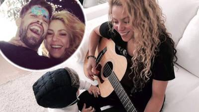 Piqué junto a Shakira y su hijo Sasha.