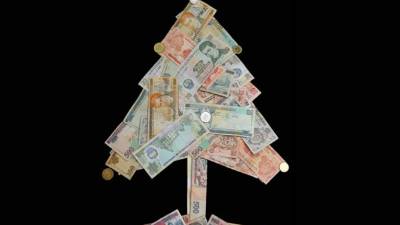 El pago de los aguinaldos es muy esperado por los hondureños para cumplir con susresponsabilidades y adquirir productos de necesidad para el hogar. Foto: Yoseph Amaya