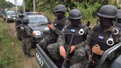 Los agentes salieron en busca de drogas, ejecutar órdenes de captura y armas en la colonia La Mesa de La Lima, Cortés, norte de Honduras.