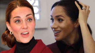 Britain's Catherine (L), Duchess of Cambridge and Britain's Meghan, Duchess of Sussex, watch Romania's Simona Halep playing US player Serena Williams during their women's singles final on day twelve of the 2019 Wimbledon Championships at The All England Lawn Tennis Club in Wimbledon, southwest London, on July 13, 2019. (Photo by Ben Curtis / POOL / AFP) / RESTRICTED TO EDITORIAL USE