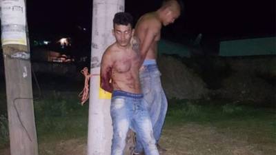 José Valladares Tróchez y Elvin Salinas Perdomo, fueron linchados y amarrados por vecinos de la zona.