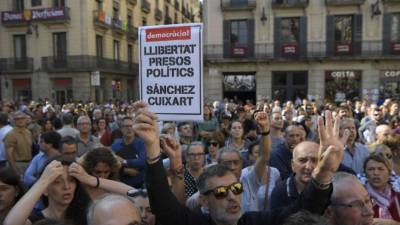 El ayuntamiento de Barcelona suspendió actividades hasta el jueves 'en solidaridad' con los detenidos. AFP