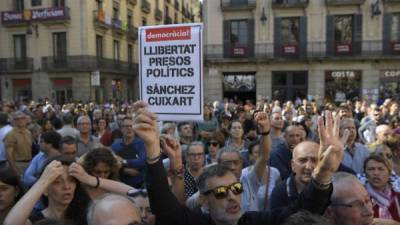 El ayuntamiento de Barcelona suspendió actividades hasta el jueves 'en solidaridad' con los detenidos. AFP