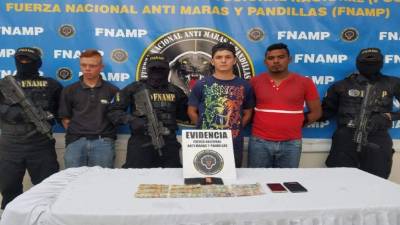 Los tres hombres están encerrados por ser sospechosos de exigirle dinero a los transportistas.