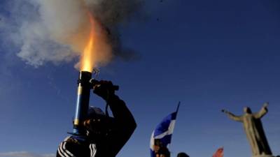 Las iglesias abrieron sus puertas para atender a los heridos y proteger a los perseguidos. AFP/Archivo