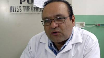 Cándido Mejía, dermatólogo.