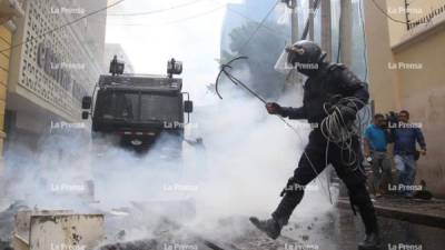 Los disturbios dejaron destrozos en diversas zonas de la capital de Honduras.