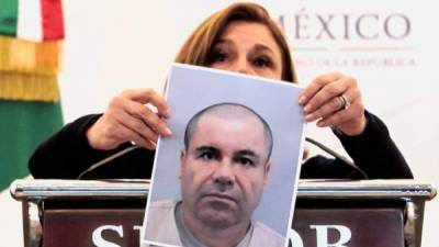 A model holds up clothing by 'El Chapo 701,' a line in clothing bearing the nickname of the jailed Mexican drug lord Joaquin 'El Chapo' Guzman Loera, during the 71 edition of IM Intermoda Mexico fashion fair in Guadalajara, Mexico, on July 16, 2019. - A woman claiming to be Guzman's daughter, Alejandrina Gisselle Guzman, launched her own brand of clothing, jewelry and liquor in January under the brand name 'El Chapo 701', the number referring to the gangster's ranking in the 2009 Forbes list of the world's richest people. (Photo by ULISES RUIZ / AFP)