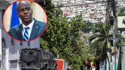 Personal militar y de seguridad haitiano bloquea la calle principal que conduce a la residencia presidencial. Foto AFP