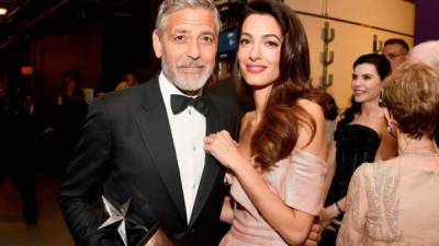 George Clooney junto a su esposa Amal.