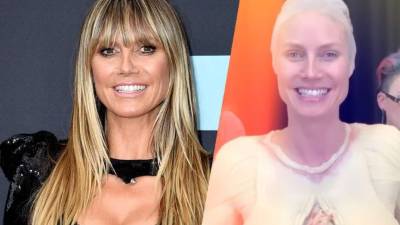 Decenas de curiosos observaban atentamente el proceso, que según ha dicho la propia Klum tardaría 10 horas en completarse.