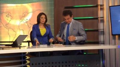 Salvador Nasralla y la modelo Iroshka Elvir en el programa Frente a Frente.