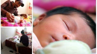 Lucely Grisel Arteaga Estrada y Martín Obando Escalón Coello con su bebita Fares Maomi. (Alejandro Alvarez)