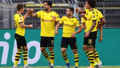 Emre Can festejó con sus compañeros el gol que le dio la victoria al Dortmund. Foto AFP.