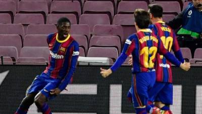 Ousmane Dembélé gritanto su gol que dio el triunfo al Barcelona ante Valladolid. Foto AFP