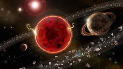 Representación artística del sistema planetario Próxima Centauri, con el exoplaneta recién descubierto, ''Próxima c (d)''./EFE.