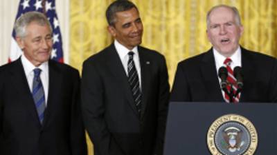 President Barack Obama and his choice for Defense Secretary, former Nebraska Sen. Chuck Hagel, left, listen as the president's choice for CIA Director, Deputy National Security Adviser for Homeland Security and Counterterrorism, John Brennan, right, speaks in the East Room of the White House in Washington, Monday, Jan. 7, 2013, where the president made the announcement. (AP Photo/Carolyn Kaster)