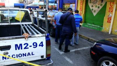 En la tercera avenida oeste de San Pedro Sula, una zona atestada de negocios, fue asesinado René Federico Altamirano Cruz.