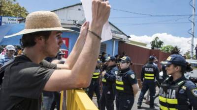 La huelga se origina en una polémica reforma fiscal que pretende mantener el equilibrio de las finanzas públicas costarricenses.