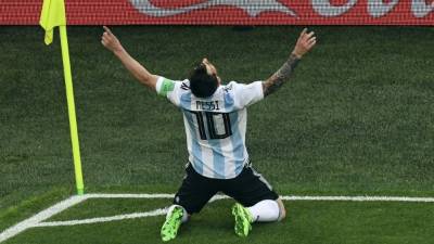 Barcelona's Argentinian forward Lionel Messi celebrates his goal during the Spanish league football match between FC Barcelona and Club Atletico de Madrid at the Camp Nou stadium in Barcelona on April 6, 2019. (Photo by PAU BARRENA / AFP)