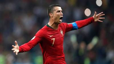 Cristiano Ronaldo celebrando su golazo de tiro libre para el empate de Portugal ante España. Foto AFP
