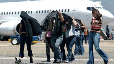 Migrantes hondureños deportados. Foto de archivo.