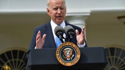 US President Joe Biden delivers remarks on Covid-19 response and the vaccination program, from the Rose Garden of the White House, Washington, DC on May 13, 2021. (Photo by Nicholas Kamm / AFP)